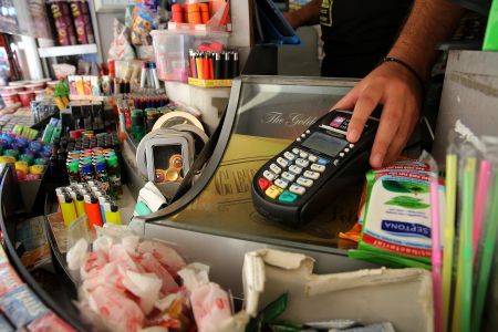 Greeks still complete vast majority of purchases in cash